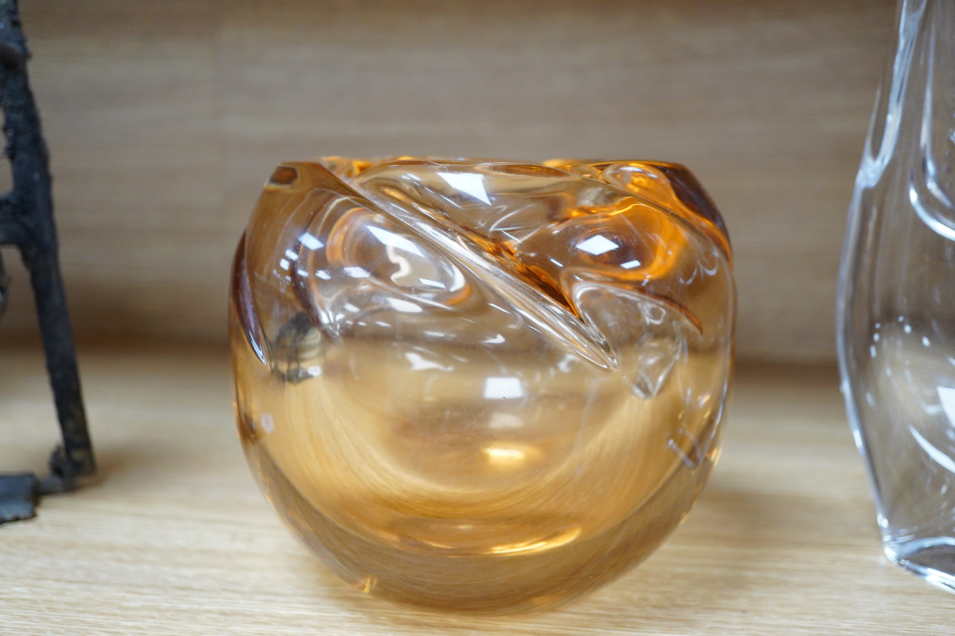 A Daum Nancy orange glass vase and a statue of an owl, largest 24cm high